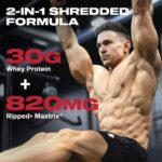 Person training in a gym with text highlighting MuscleTech Nitro-Tech Ripped’s 2-in-1 Shredded Formula, featuring 30g of whey protein and 820mg Ripped+ Matrix to support muscle performance and definition.